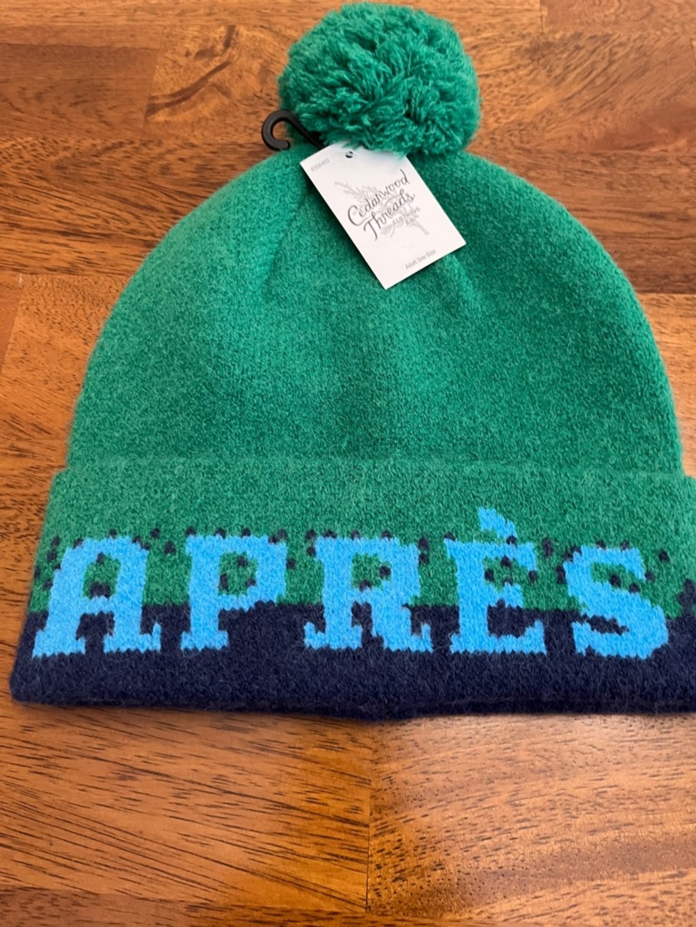 Cozy Green Pom Knit Beanie with APRÈS Detail